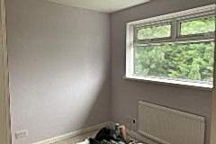 Bedroom completed.  Room re-plaster: Plaster directly over artex ceiling. Plaster all walls, window reveals. Painting and decorating undertaken and completed.