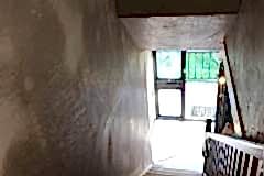 Stairwell walls and ceiling application of new Plaster.