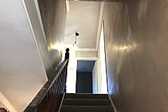 Stairwell walls and ceiling application of new Plaster.