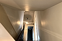 Stairwell walls and ceiling application of new Plaster.