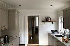 Kitchen re-plastered ceiling and walls, coving fitted.