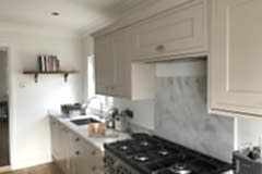 Kitchen re-plastered ceiling and walls, coving fitted.