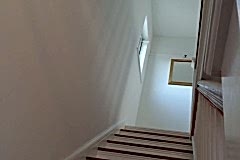 Property refurbishment re-build wall areas, stairwell walls and ceiling - complete plastering