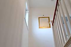 Property refurbishment re-build wall areas, stairwell walls and ceiling - complete plastering